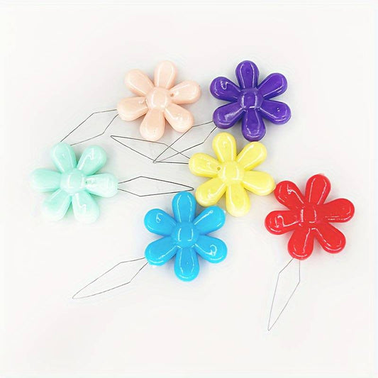 Enhebrador de agujas flor